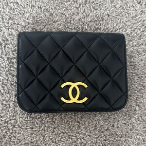 CHANEL Black Quilted Wallet with Gold Logo